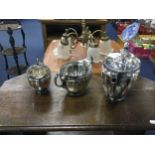 A SILVER PLATED THREE PIECE TEA SERVICE