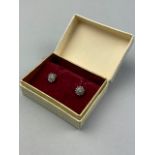 A PAIR OF GOLD AND DIAMOND CLUSTER EARRINGS
