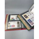 A COLLECTION OF CIGARETTE CARDS AND STAMPS