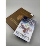 A TERRY PRATCHETT WINTERSMITH SIGNED FIRST EDITION ALONG WITH AN ILLUSTRATED SHAKESPEARE VOLUME