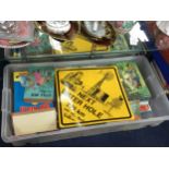 A COLLECTION OF CHILDREN'S BOOKS ALONG WITH AN AUSTRALIAN SOUVENIR SIGN