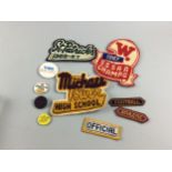A COLLECTION OF CANADIAN 1960/70'S VARSITY EMBROIDERED PATCHES ALONG WITH 70s PINBADGES