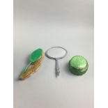 A VINTAGE GREEN ENAMELLED VANITY SET AND A SIMILAR BOX