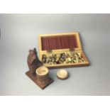 A RUSSIAN CHESS SET AND A CARVED BEAR