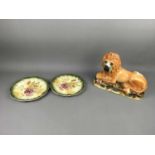 A VICTORIAN STAFFORDSHIRE LION ALONG WITH TWO DESSERT PLATES