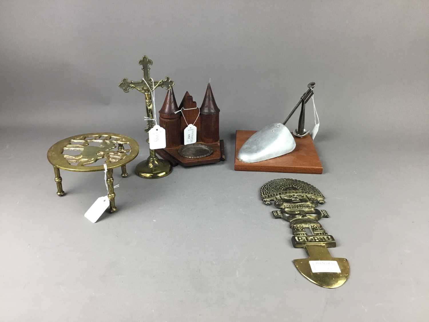 A WOODEN AND METAL SHOE LAST ALONG WITH OTHER BRASS AND WOODEN ITEMS