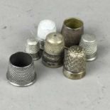 A CHARLES HORNER SILVER THIMBLE ALONG WITH OTHER THIMBLES
