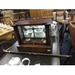 A SET OF 20TH CENTURY BRASS SCALES IN A DISPLAY CASE AND A WALKING STICK