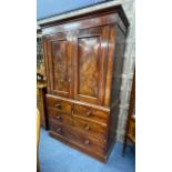 A MAHOGANY LINEN CUPBOARD