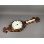 A VICTORIAN OAK WHEEL BAROMETER