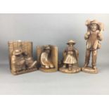 A GROUP OF PERUVIAN CARVED WOOD FIGURES AND BOOKENDS
