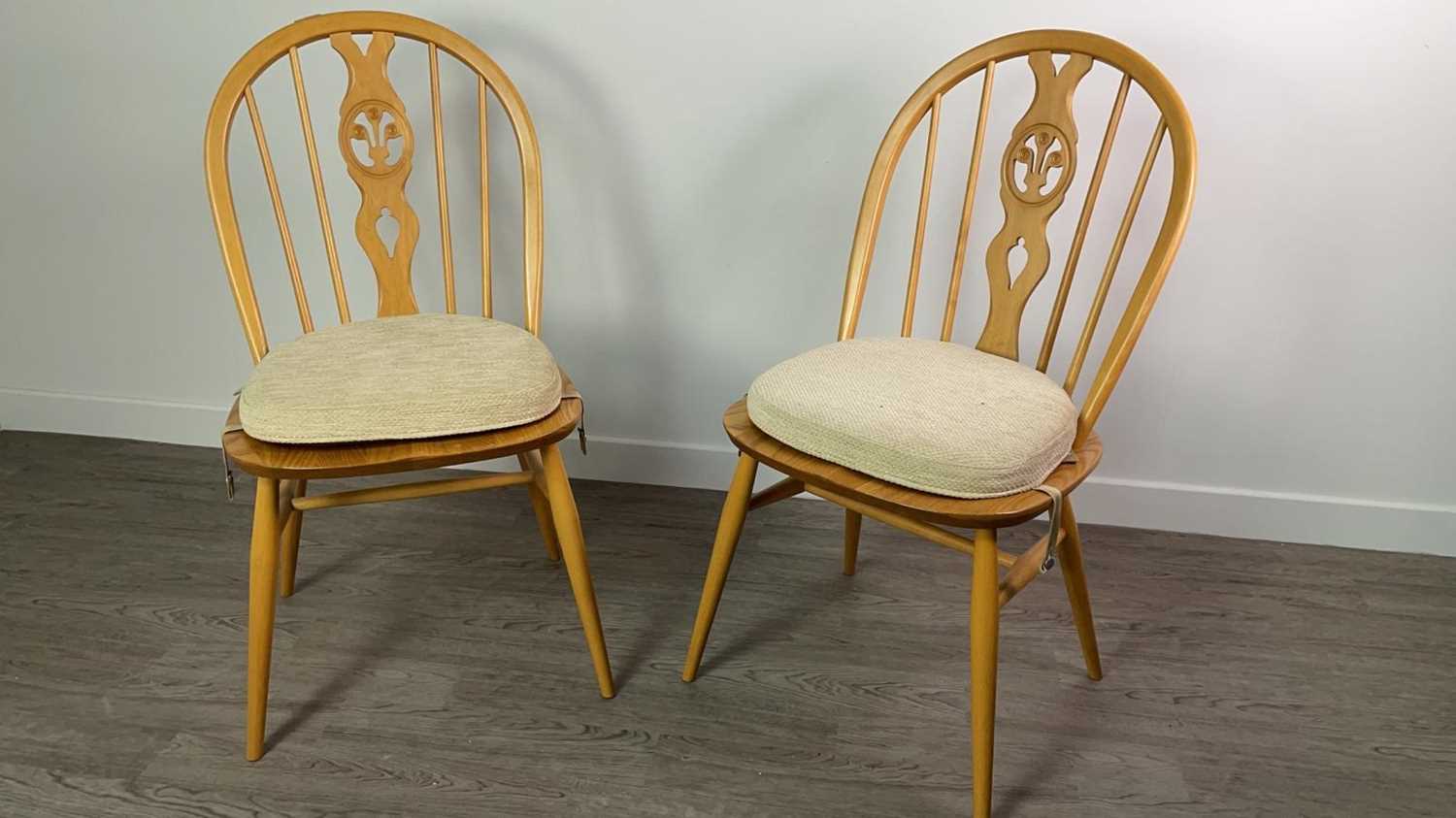 A PAIR OF ERCOL DINING CHAIRS