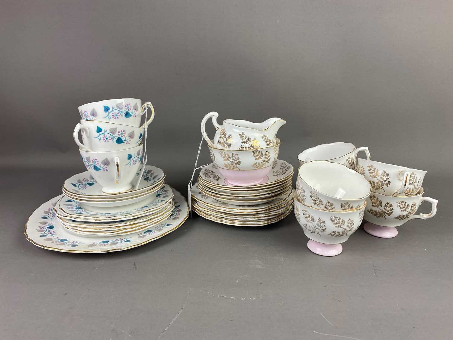 A COLCLOUGH TEA SERVICE AND A ROYAL VALE PART TEA SERVICE