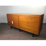 A MID CENTURY TEAK SIDEBOARD