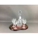 A CRYSTAL DECANTER AND SIX GLASSES SET