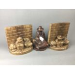 A GROUP OF PERUVIAN CARVED WOOD FIGURES AND BOOKENDS