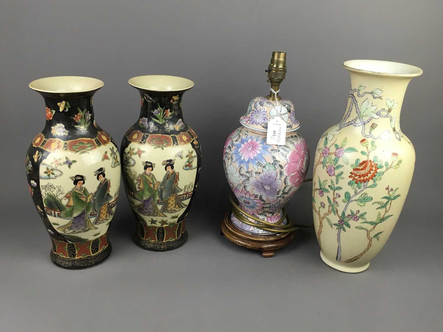 A LOT OF THREE VASES ALONG WITH A LAMP