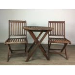 A WOODEN GARDEN TABLE AND TWO CHAIRS