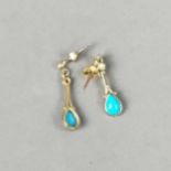 A PAIR OF NINE CARAT GOLD AND TURQUOISE EARRINGS
