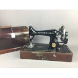 A SINGER PORTABLE SEWING MACHINE