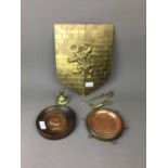 A DECORATIVE BRASS WALL HANGING SHIELD AND OTHER OBJECTS