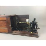 A VINTAGE PORTABLE SEWING MACHINE