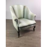 A 19TH CENTURY UPHOLSTERED ARMCHAIR