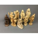 A COLLECTION OF PERUVIAN CARVED WOOD FIGURES