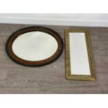 A BRASS EMBOSSED RECTANGULAR WALL MIRROR AND ANOTHER WALL MIRROR