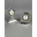 A LOT OF TWO EARLY 20TH CENTURY SILVER CASED MANTEL CLOCKS