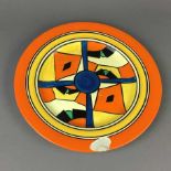 AN EARLY 20TH CENTURY CLARICE CLIFF BIZARRE CIRCULAR PLATE