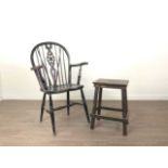 A STAINED WOOD WINDSOR STYLE ARMCHAIR AND A STOOL