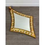 A REPRODUCTION GILT FRAMED DIAMOND SHAPED WALL MIRROR