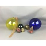 A LOT OF FOUR COLOURED GLASS BOUYS