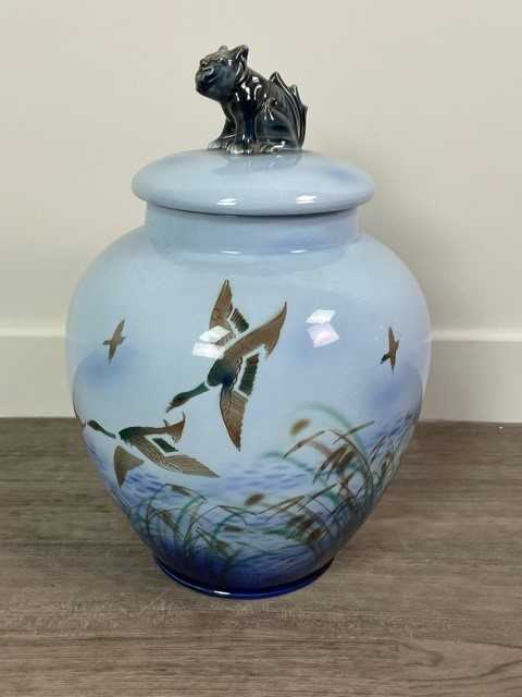 A FALCON WARE GINGER JAR AND COVER