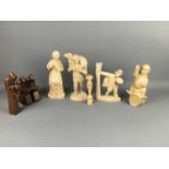 A COLLECTION OF PERUVIAN CARVED ORANGE WOOD AND WALNUT FIGURES AND ANIMALS
