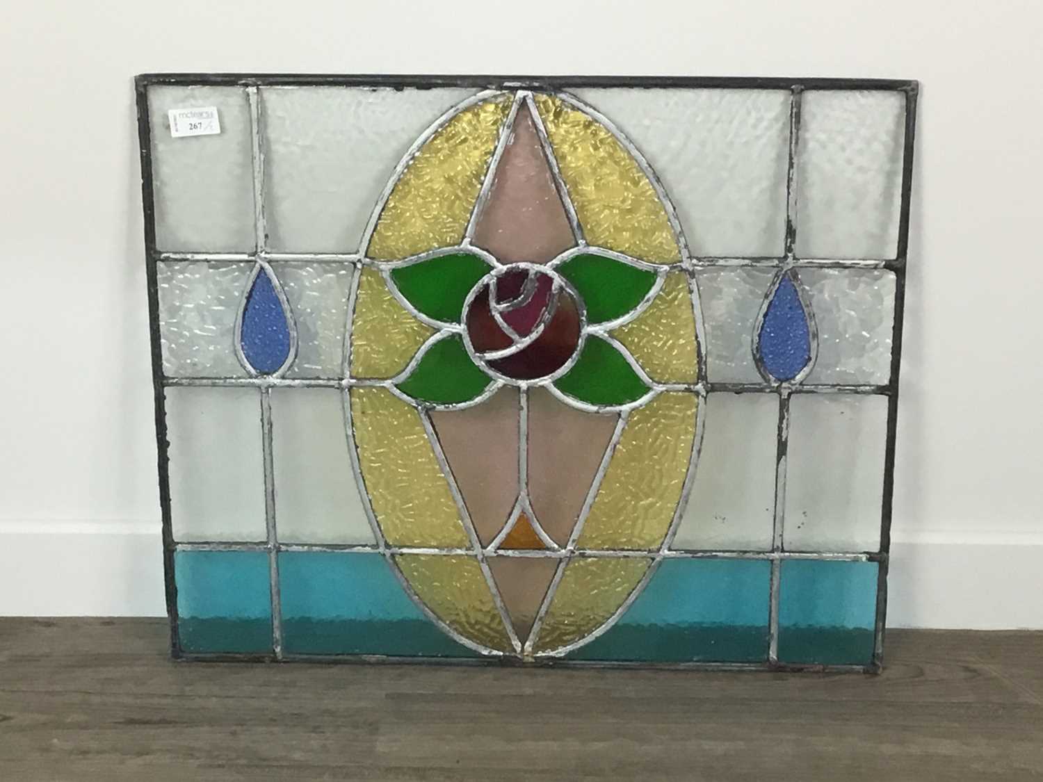 AN EARLY 20TH CENTURY LEADED GLASS PANEL, ALONG WITH ANOTHER