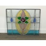 AN EARLY 20TH CENTURY LEADED GLASS PANEL, ALONG WITH ANOTHER