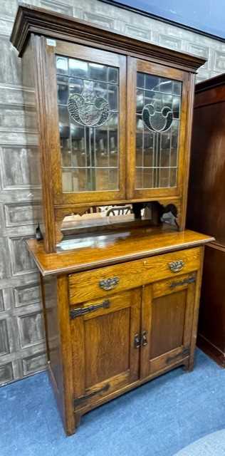 A LATE 19TH/EARLY 20TH CENTURY OAK BOOKCASE ON CHEST