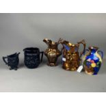 A HAND PAINTED TWIN HANDLED VASE, MATCHING JUG AND OTHER JUGS