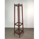 A STAINED WOOD HAT AND COAT STAND
