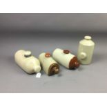 A LOT OF EIGHT STONEWARE HOT WATER BOTTLES