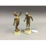 A PAIR OF CAST METAL FIGURES OF CHILDREN