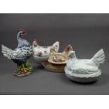 A FOSTERS POTTERY HEN, CLOAKING HEN AND OTHER SIMILAR CERAMICS