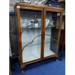 A WALNUT DISPLAY CABINET