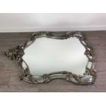 A LARGE SILVERED ROCOCO STYLE MIRROR