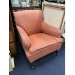 AN UPHOLSTERED ARMCHAIR AND A MAHOGANY WINE TABLE