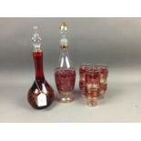 A GLASS LIQEUER SET, ALONG WITH COLLECTOR'S
