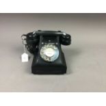 A BLACK BAKELITE TELEPHONE