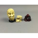 A CHINESE NOVELTY RESIN HEAD STUDY ALONG WITH TWO RESIN NETSUKE